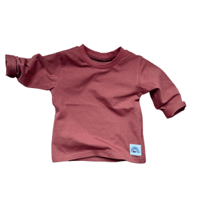 T-shirt bébé manches longues terracotta en coton doux, coupe près du corps, fabrication française Moomie